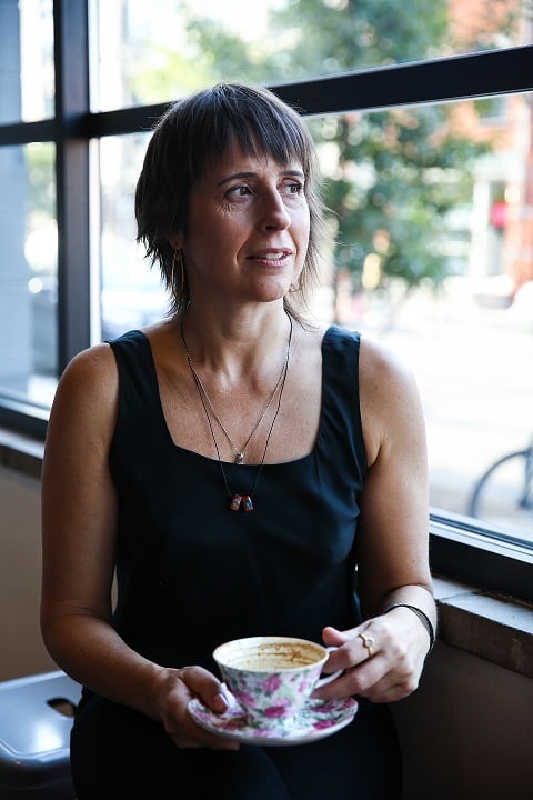 Brooklyn Book Doctor in Brooklyn cafe looking out big picture window